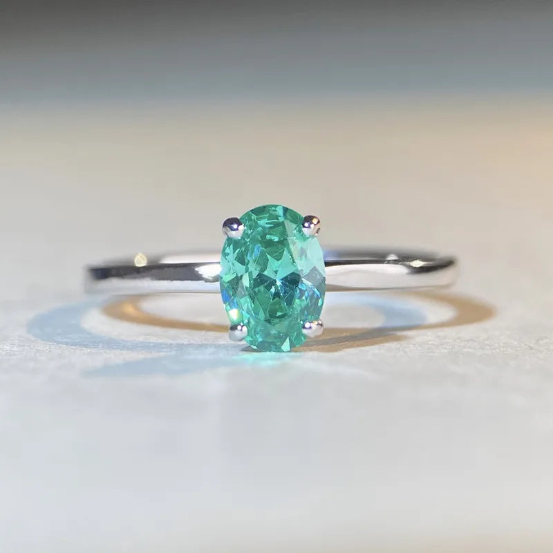 Bague solitaire pierre ovale turquoise argent 925 élégante - vue de face
