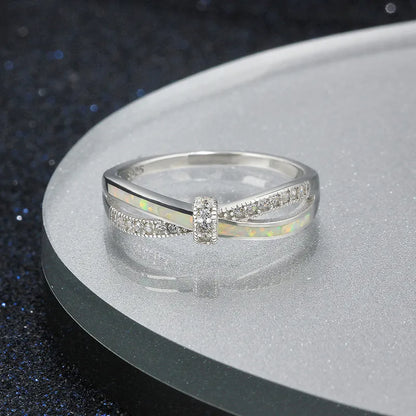 Bague opale irisée croisée pavé zircons argent 925 unique - vue de face
