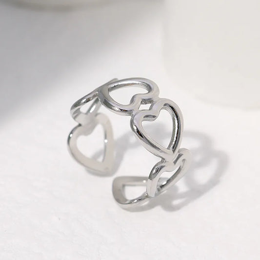Bague ajustable cœurs entremêlés acier inoxydable argenté - design romantique
