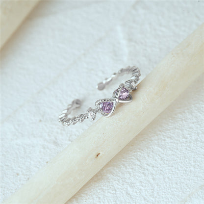 Bague nœud infini argent s925 cristaux violets -
