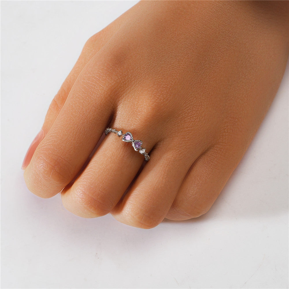 Bague nœud infini argent s925 cristaux violets - portée main
