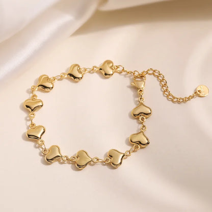 Bracelet chaîne cœurs dorés acier inoxydable plaqué or - vue de face
