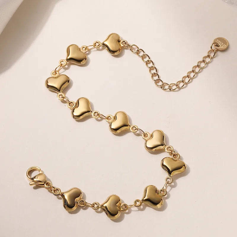 Bracelet chaîne cœurs dorés acier inoxydable plaqué or - 
