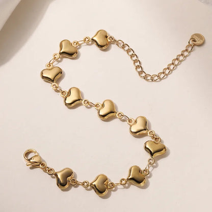 Bracelet chaîne cœurs dorés acier inoxydable plaqué or - 
