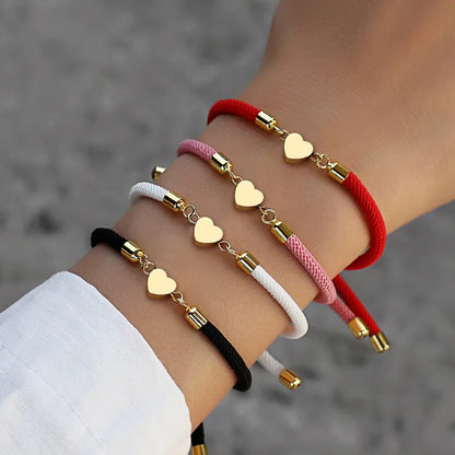 Bracelet cordon cœur doré acier inoxydable ajustable - vue de face
