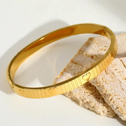 Bracelet cœurs relief plaqué or 18K acier inoxydable - vue de face